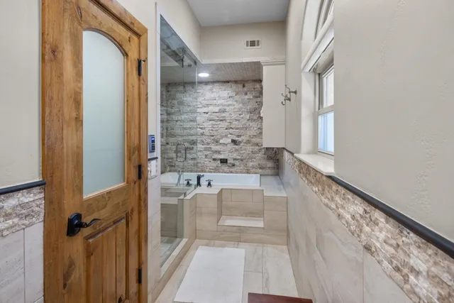 a view of a patio with swimming pool