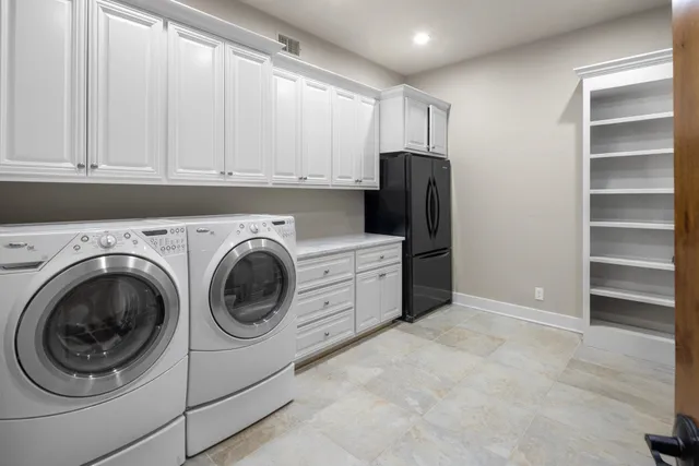 a view of a house with backyard porch and sitting area