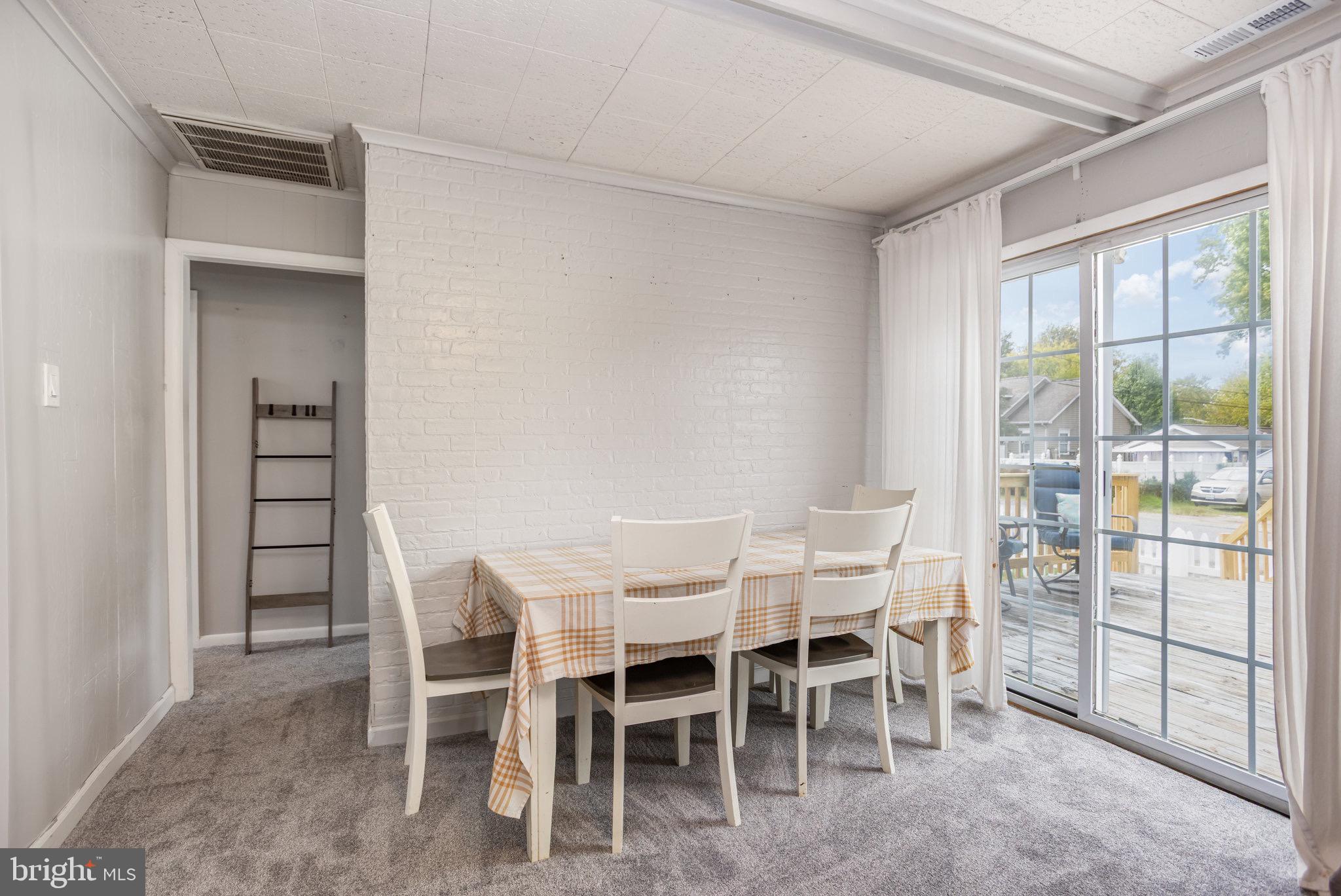 33 Honeycomb Road Middle River, MD 21220 - Photo 11 of 29 a dining room with furniture and window
