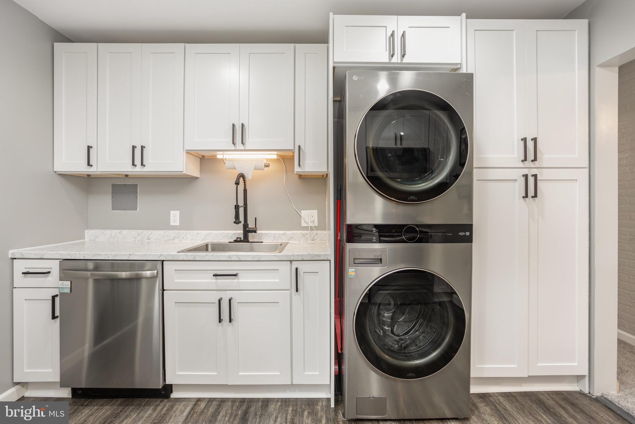 33 Honeycomb Road Middle River, MD 21220 - Photo 15 of 29 a kitchen with sink a washer and dryer