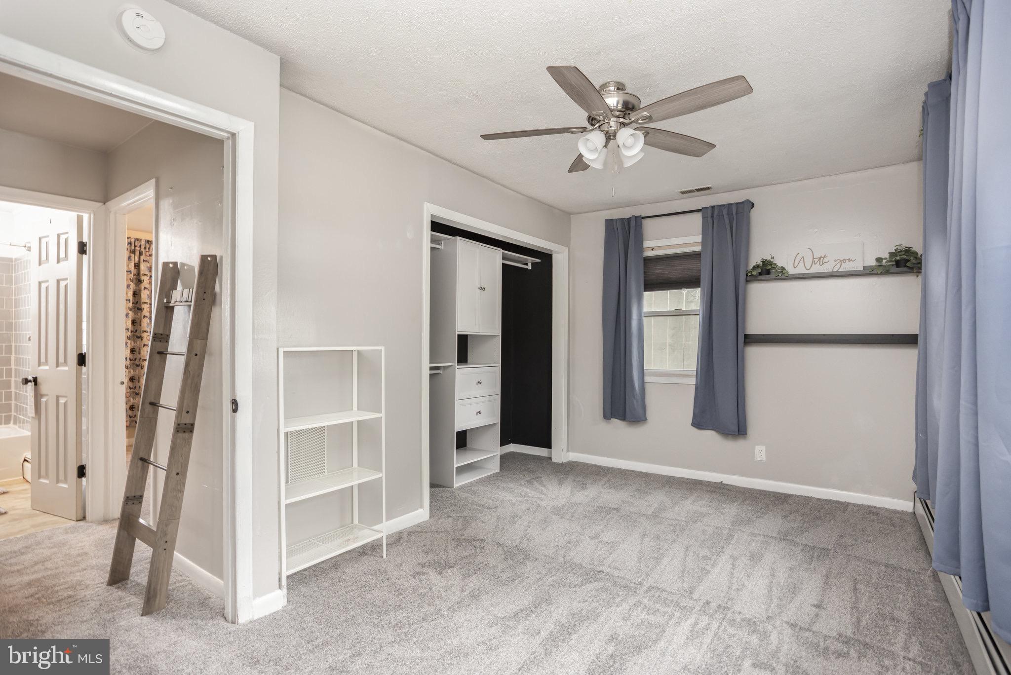 33 Honeycomb Road Middle River, MD 21220 - Photo 17 of 29 a view of a livingroom with a ceiling fan