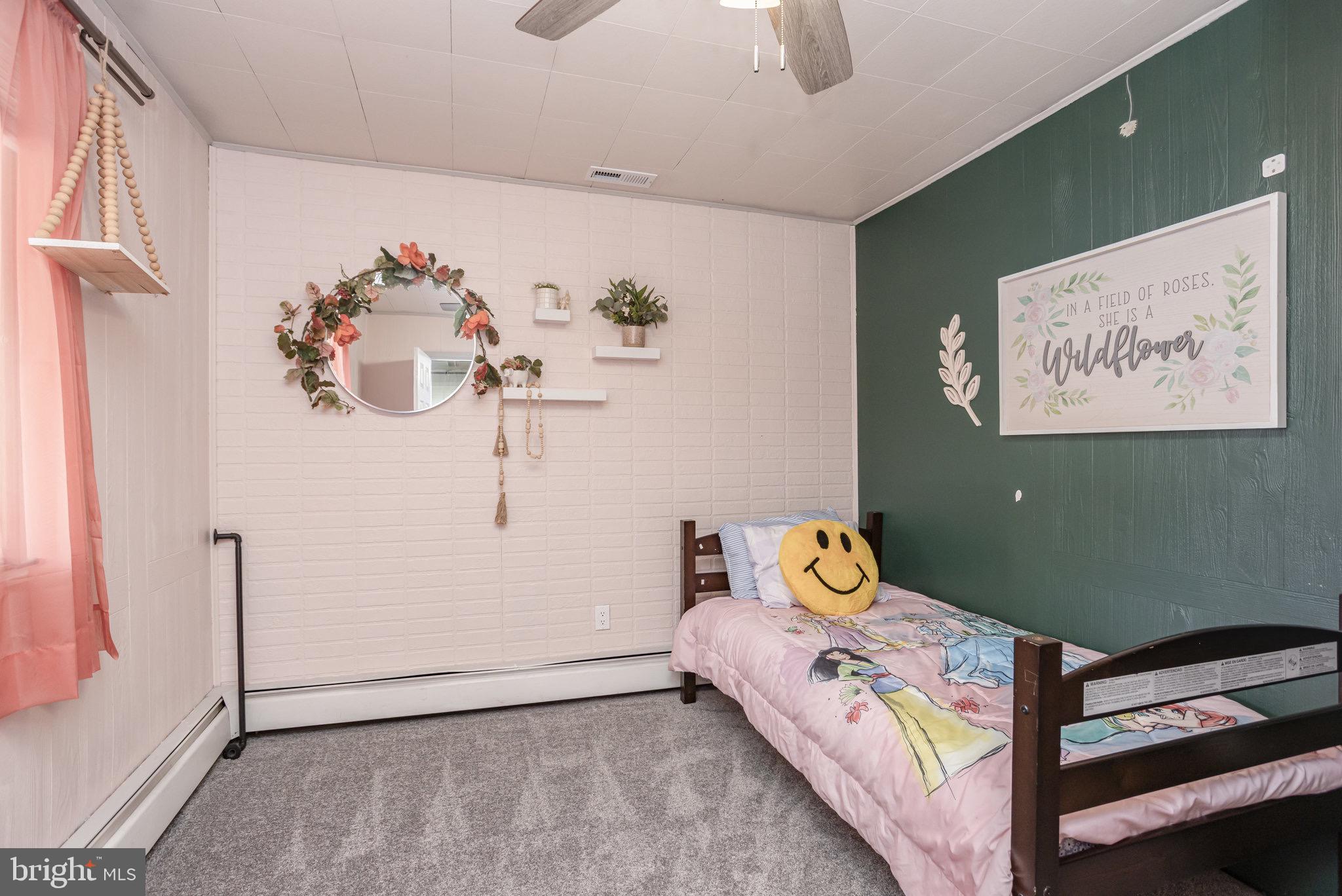 33 Honeycomb Road Middle River, MD 21220 - Photo 25 of 29 a bedroom with a bed and a window