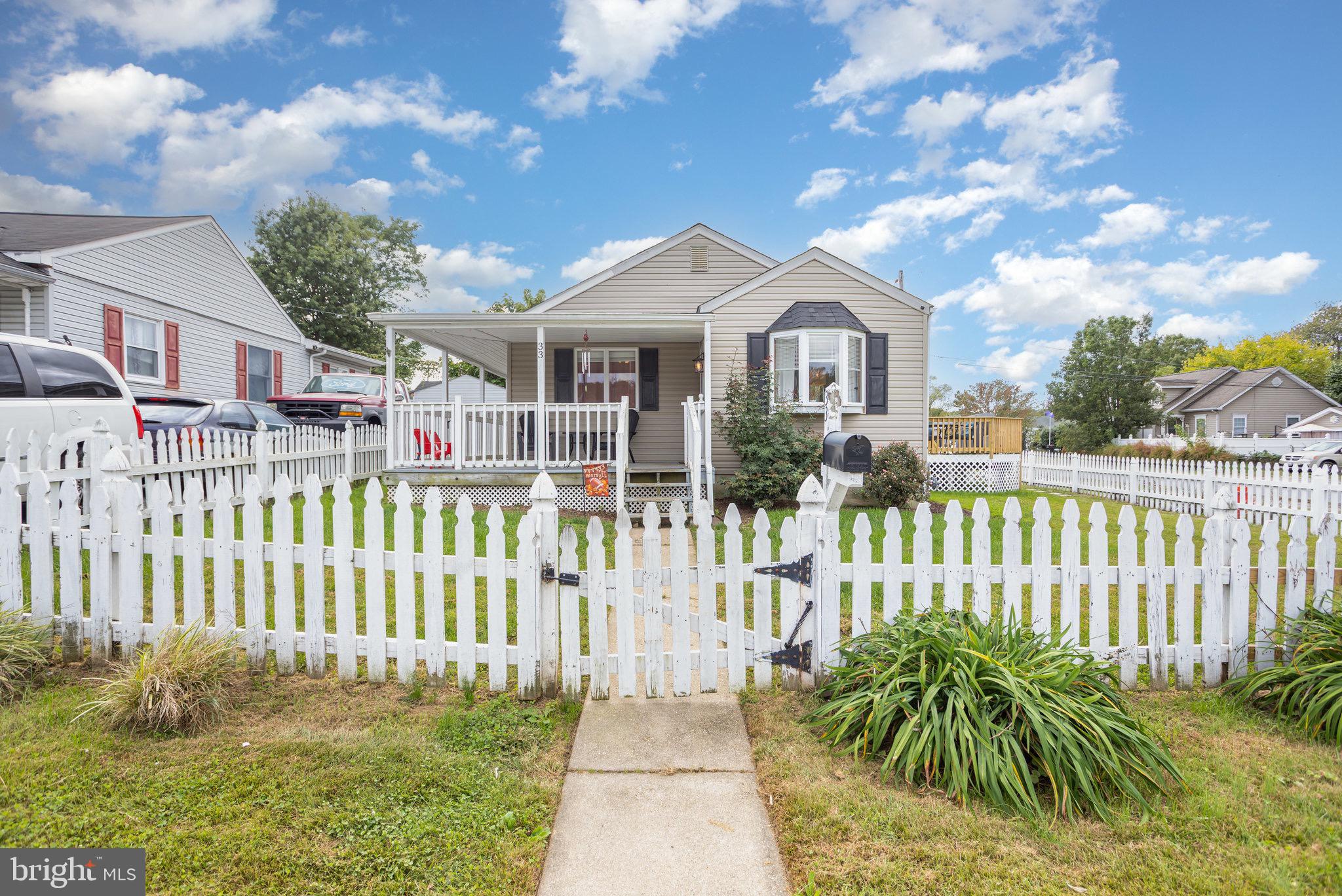 33 Honeycomb Road Middle River, MD 21220 - Photo 3 of 29 a front view of a house with a yard