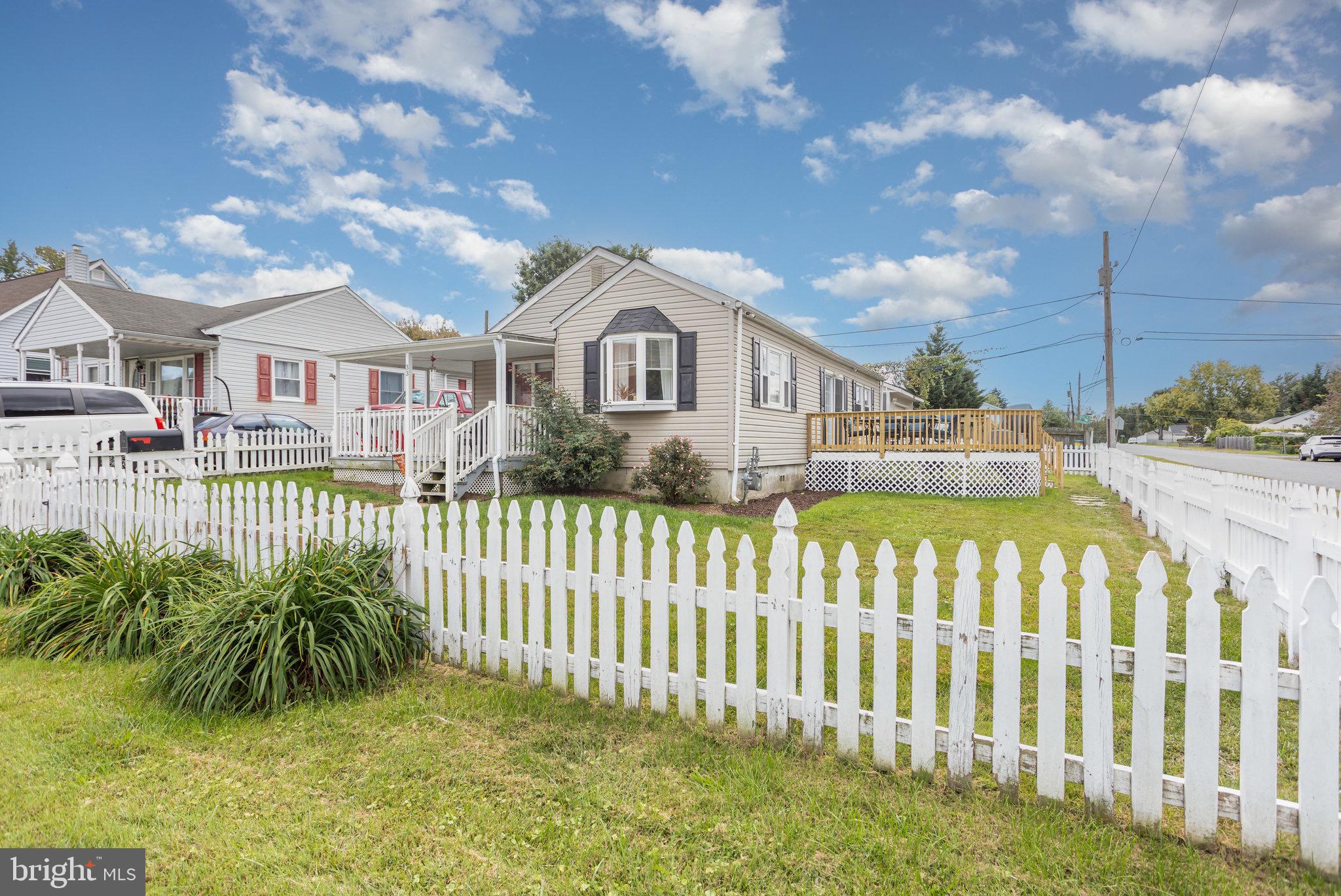 33 Honeycomb Road Middle River, MD 21220 - Photo 4 of 29 a front view of a house with a garden