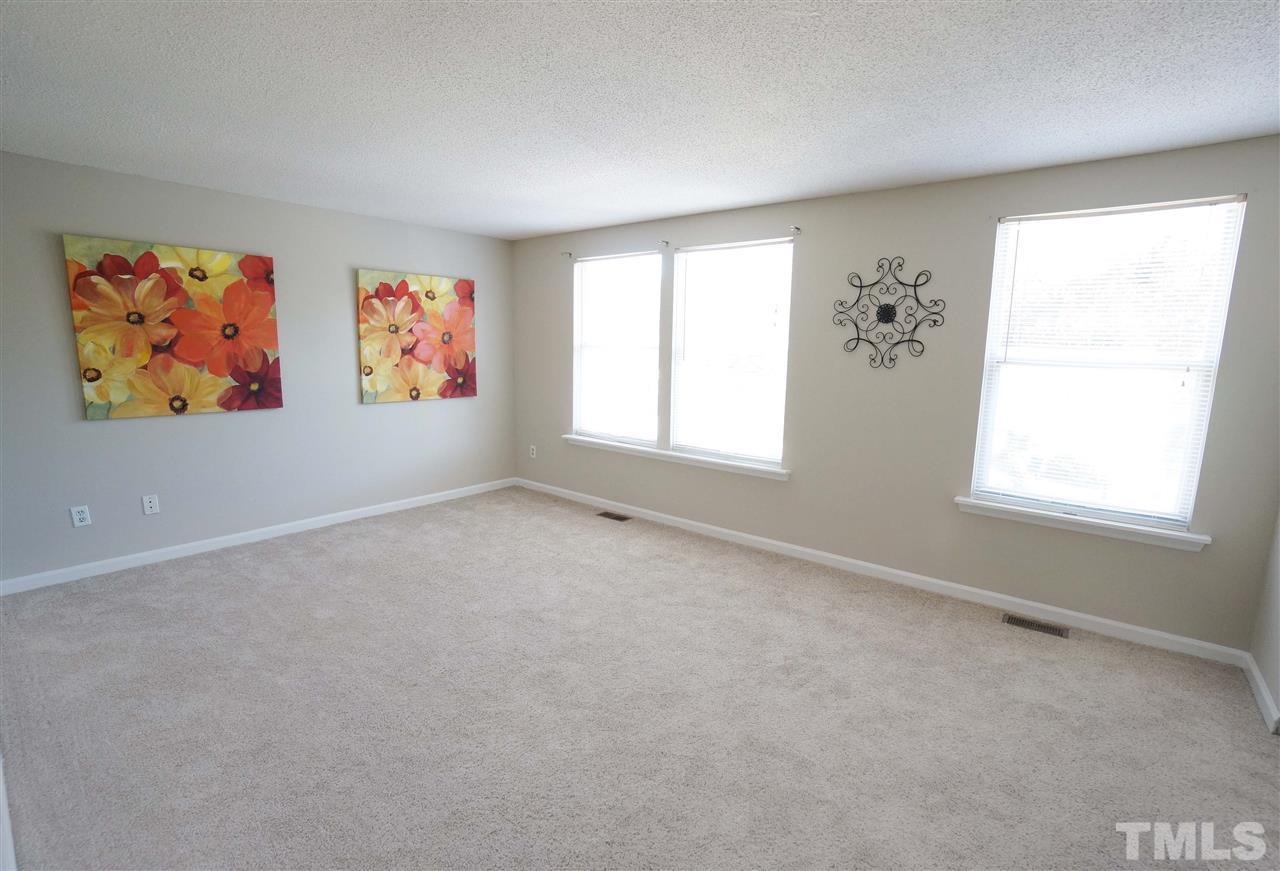 1137 Villa Green Court Raleigh, NC 27612 - Photo 11 of 14 Bright & spacious bedroom offers space & versatility for your growing needs.