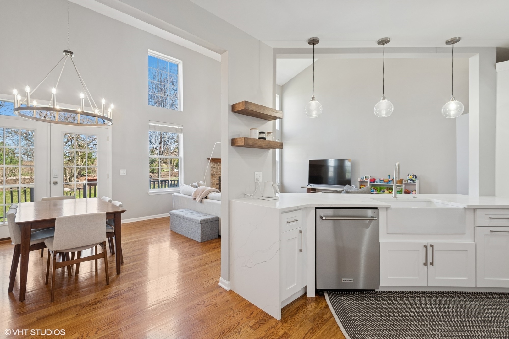54 Andover Circle Northbrook, IL 60062 - Photo 11 of 26 a kitchen with a white cabinets and chairs