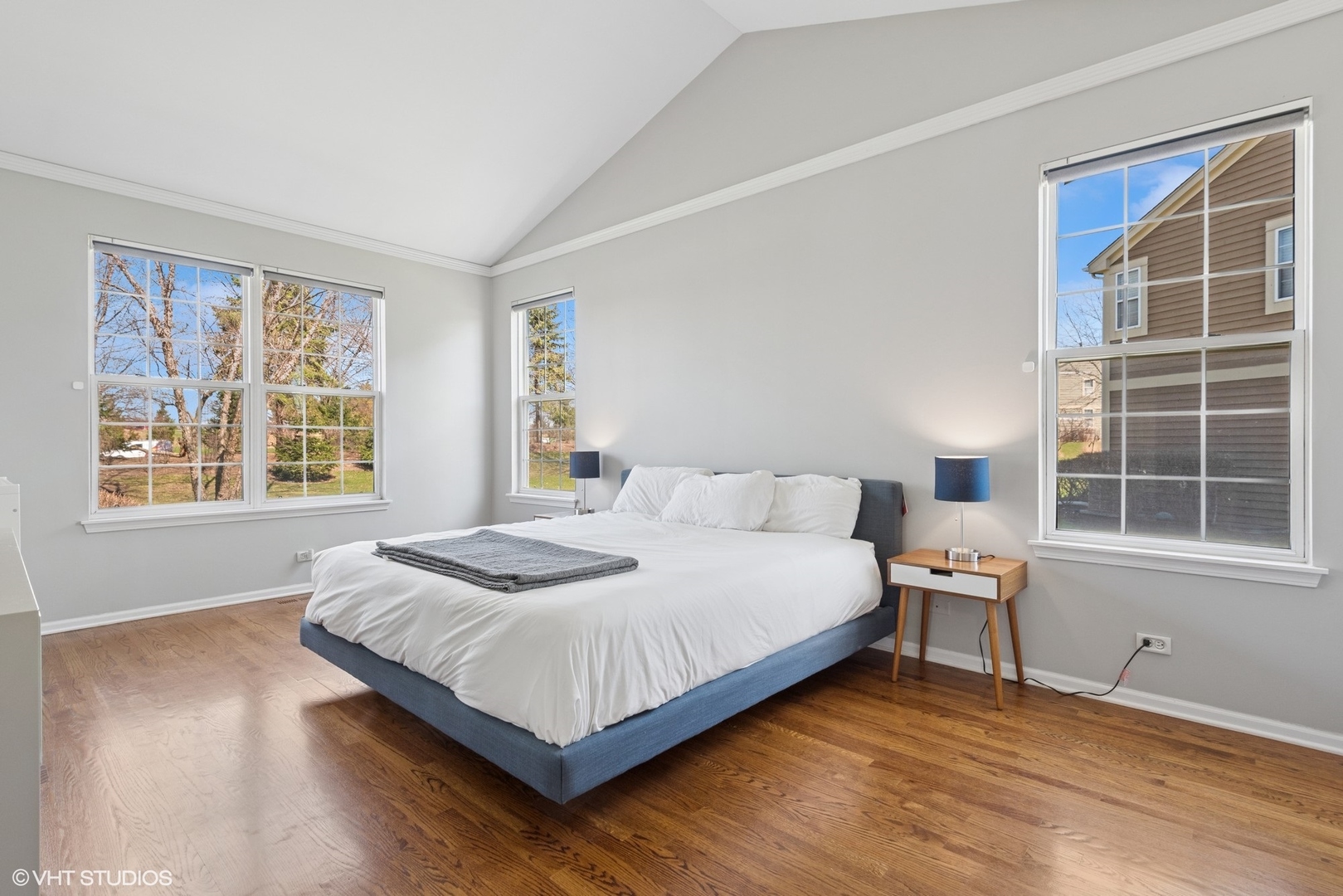 54 Andover Circle Northbrook, IL 60062 - Photo 13 of 26 a bedroom with a bed and windows