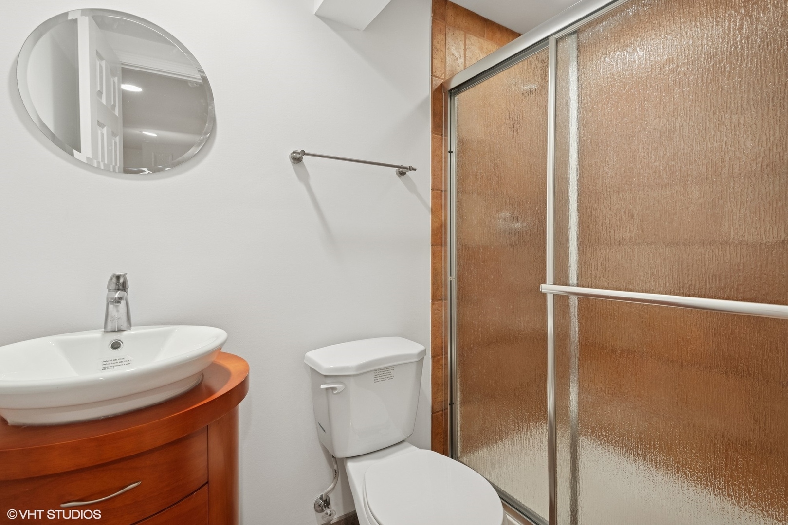 54 Andover Circle Northbrook, IL 60062 - Photo 20 of 26 a bathroom with a toilet and a shower