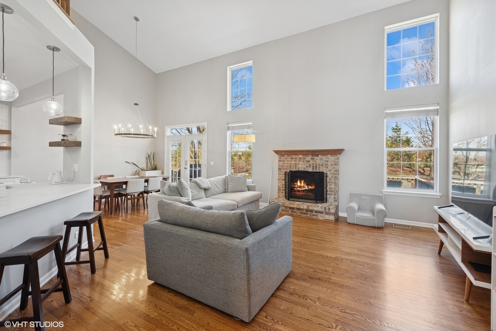 54 Andover Circle Northbrook, IL 60062 - Photo 4 of 26 a living room with furniture and a fireplace