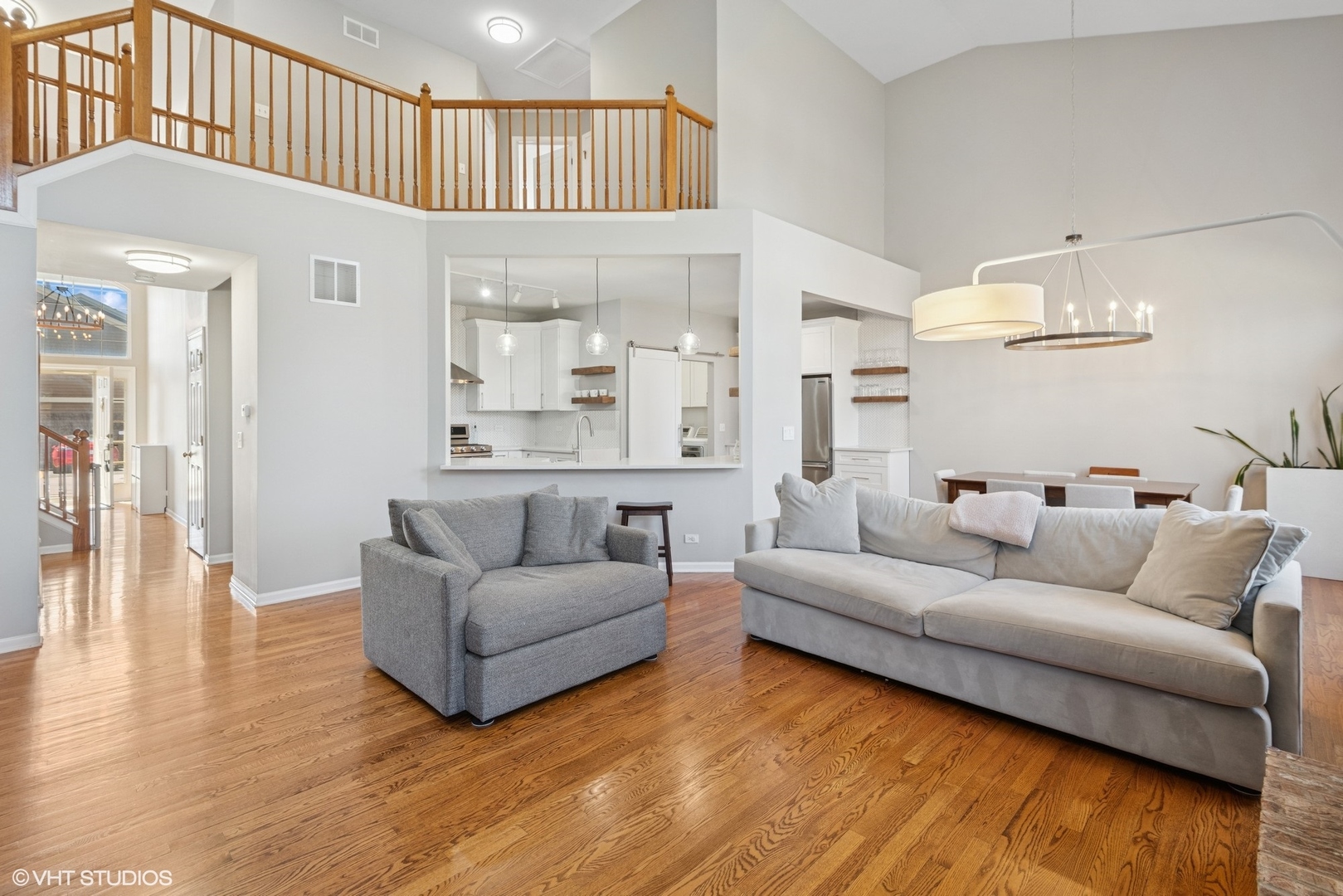 54 Andover Circle Northbrook, IL 60062 - Photo 6 of 26 a living room with furniture and a wooden floor