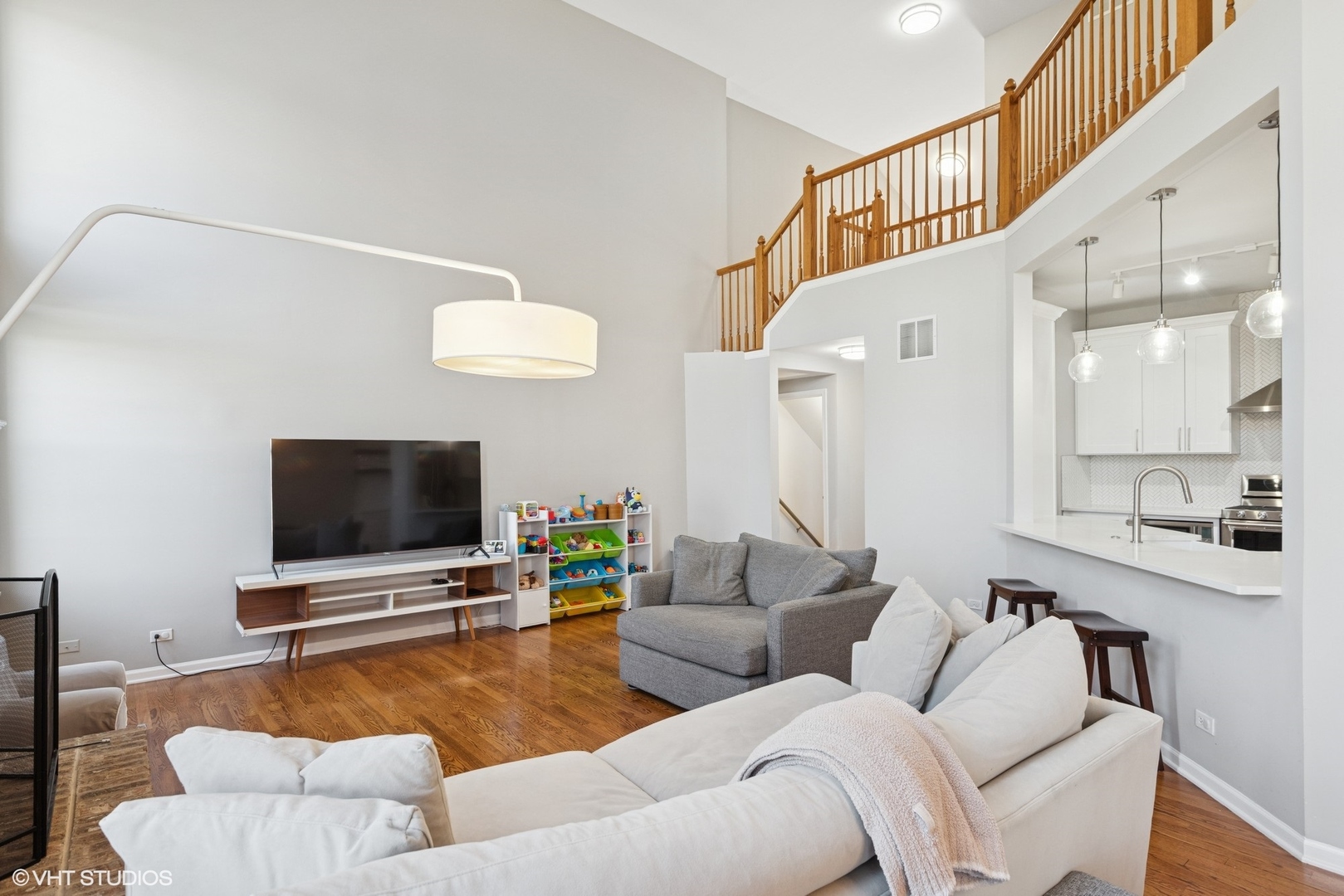 54 Andover Circle Northbrook, IL 60062 - Photo 7 of 26 a living room with furniture and a flat screen tv