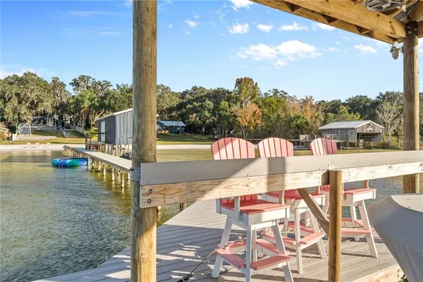 a view of a swimming pool with an ocean view