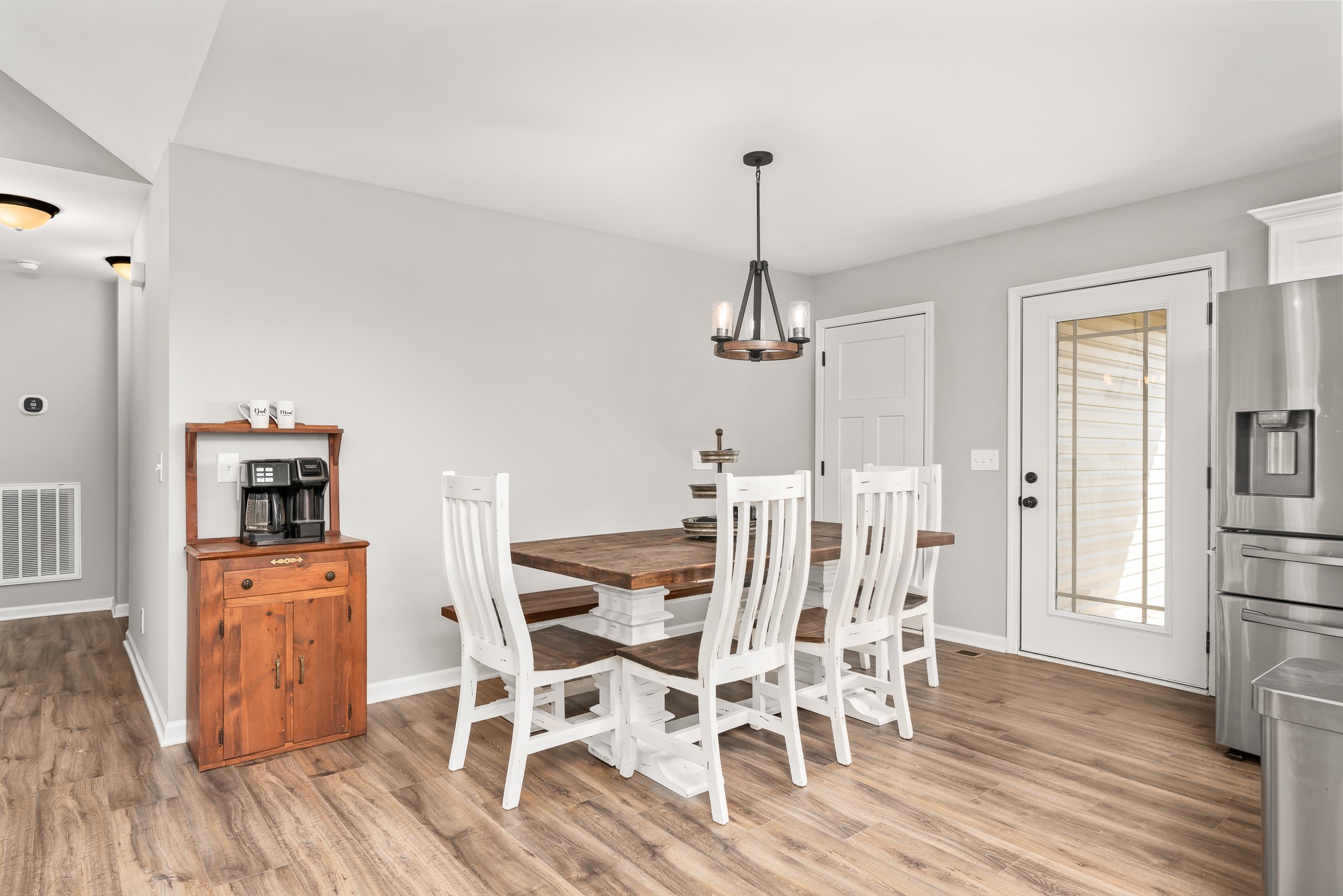 8606 Fredonia Road Manchester, TN 37355 - Photo 13 of 29 a view of a dining room with furniture and wooden floor