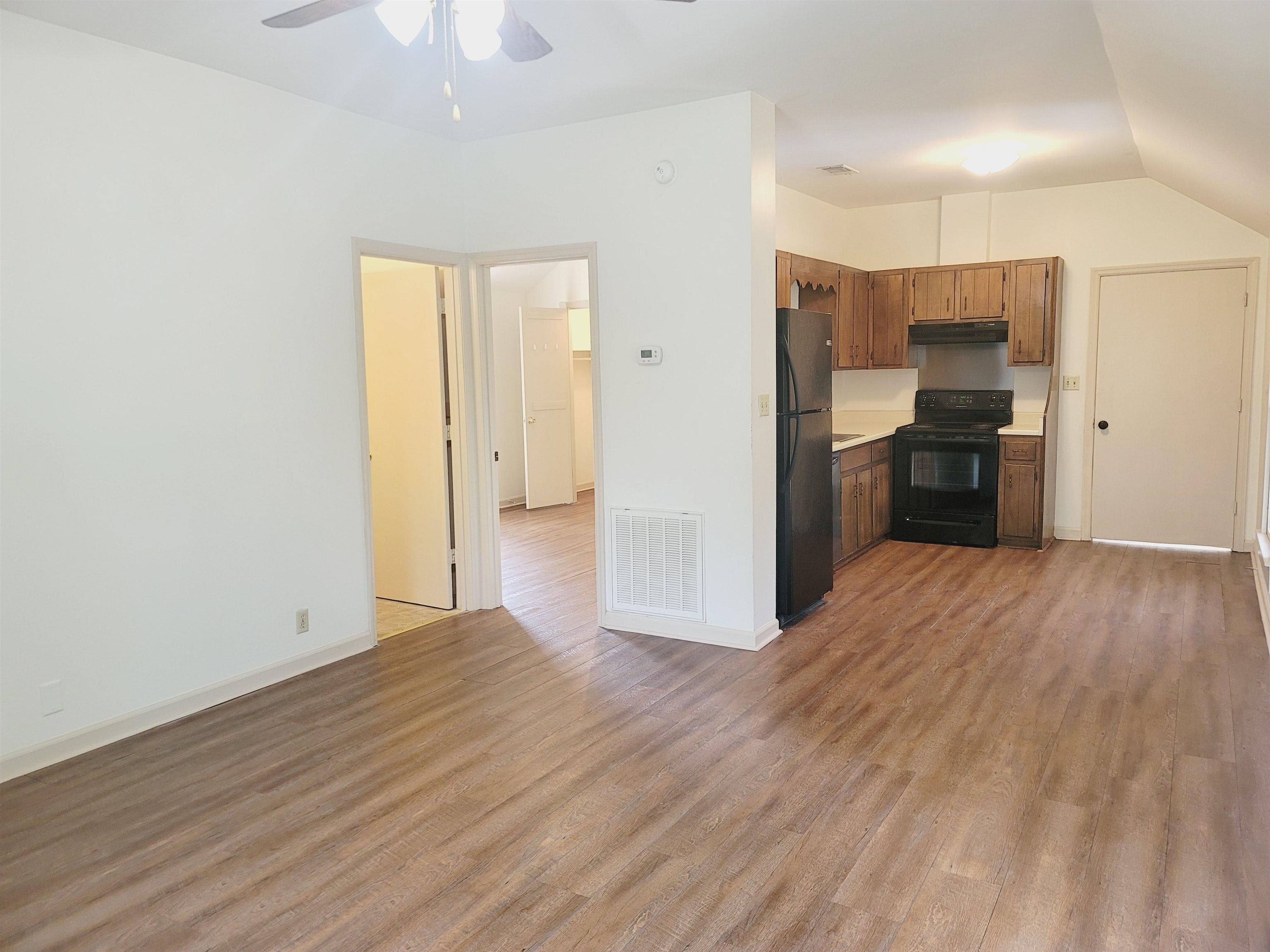 302 Jefferson Street, Unit 2 Springfield, GA 31329 - Photo 13 of 23 a view of a kitchen with wooden floor