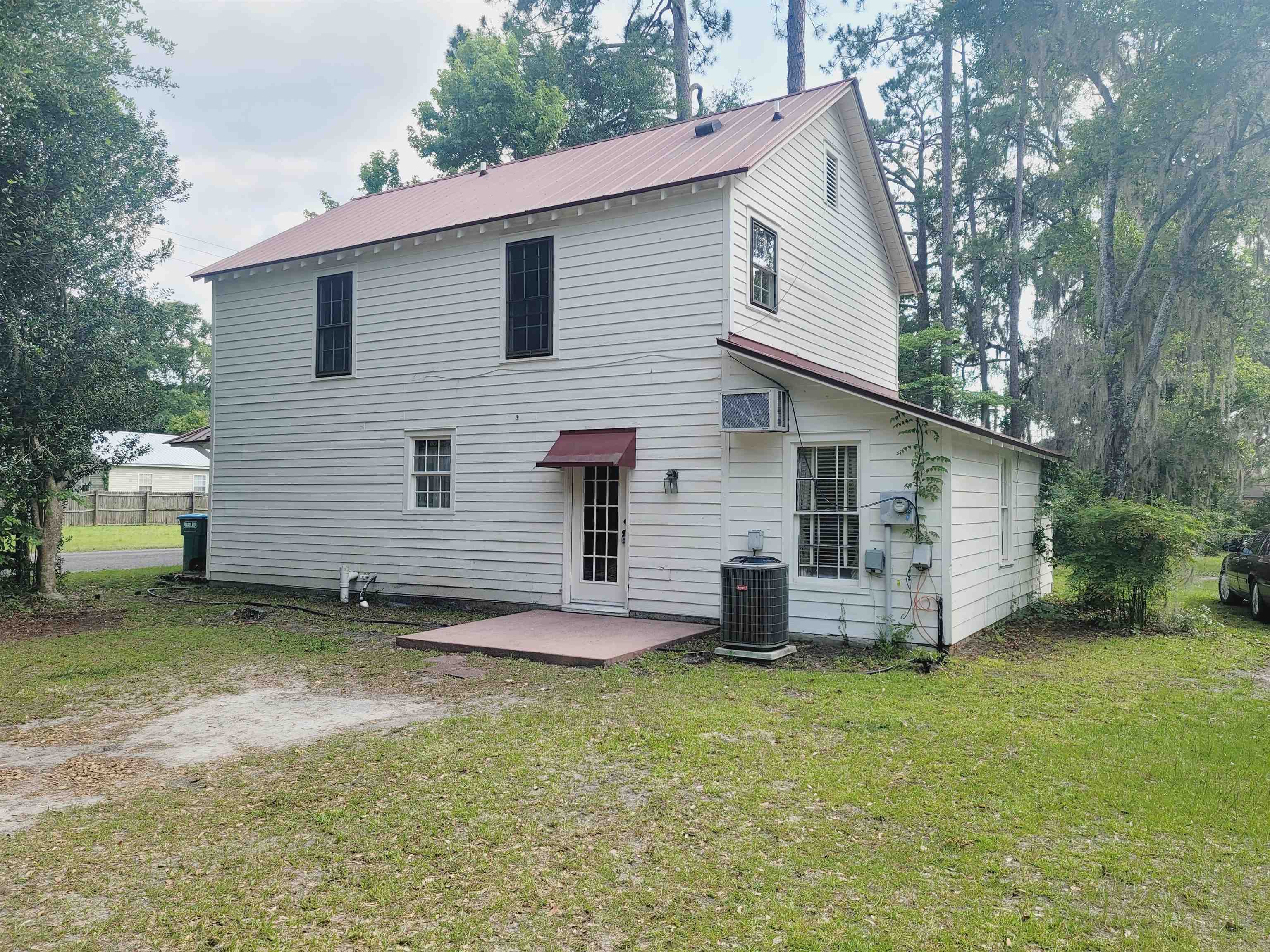 302 Jefferson Street, Unit 2 Springfield, GA 31329 - Photo 2 of 23 a view of a house with a yard