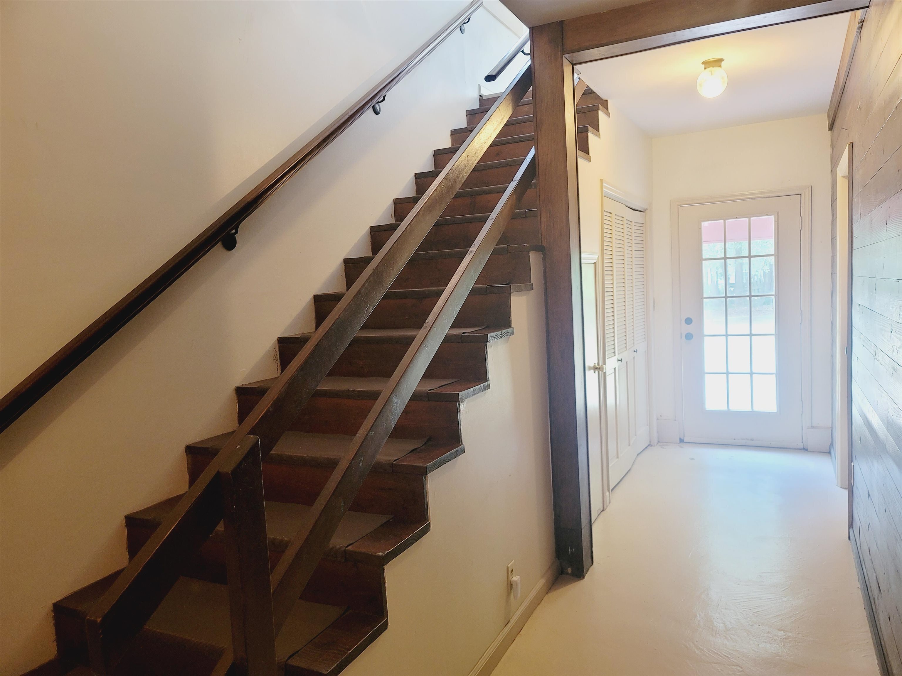 302 Jefferson Street, Unit 2 Springfield, GA 31329 - Photo 6 of 23 a view of an entryway with wooden floor and windows