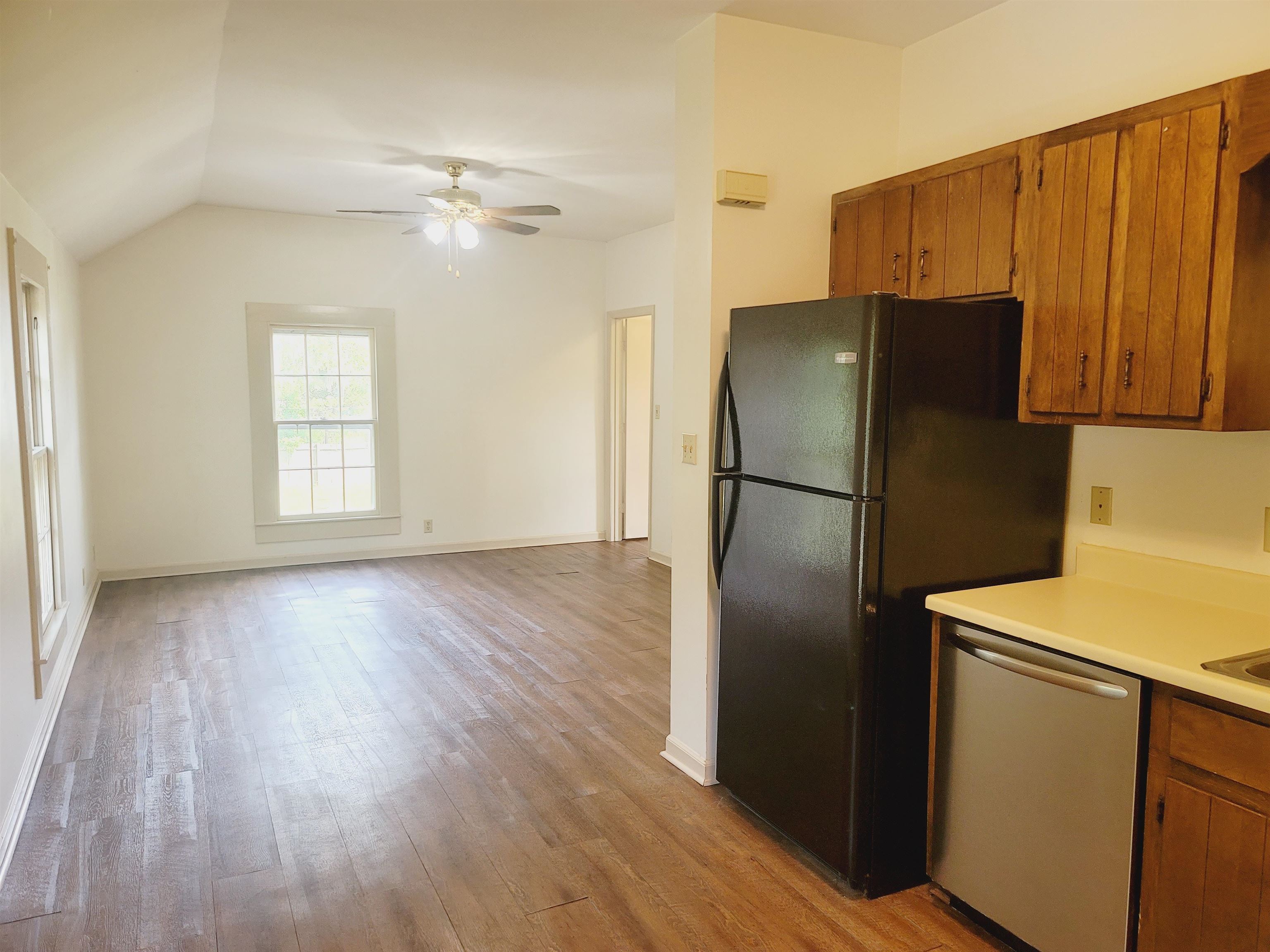 302 Jefferson Street, Unit 2 Springfield, GA 31329 - Photo 10 of 23 a metallic refrigerator freezer sitting in a kitchen