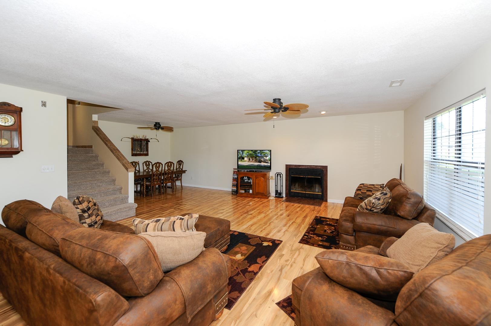 444 Disco Loop Road Friendsville, TN 37737 - Photo 5 of 40 Living room with fireplace