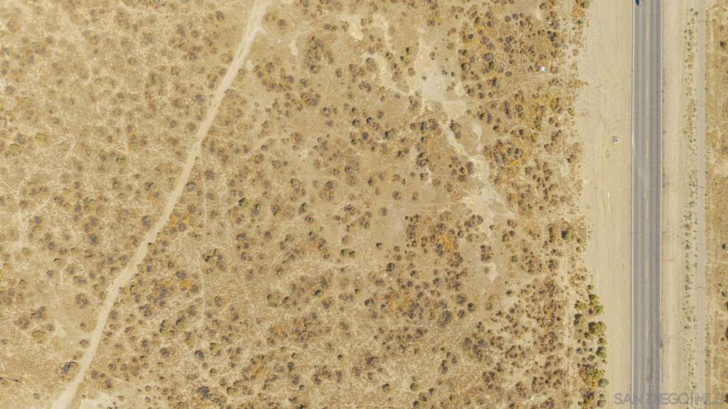 0 Challenger Way Lancaster, CA 93535 - Photo 15 of 43 a bathroom with a shower curtain