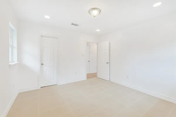 an empty room with an entryway