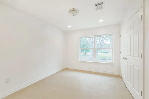 an empty room with a window
