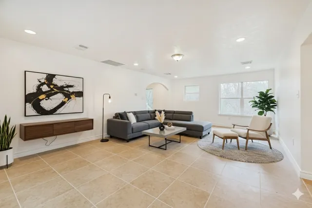 a living room with furniture and a couch