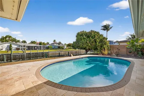 a view of outdoor space yard swimming pool and outdoor seating