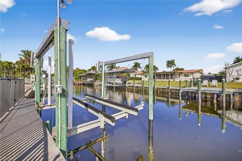 a view of a balcony with chairs