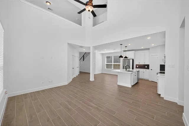 a view of kitchen with furniture and wooden floor