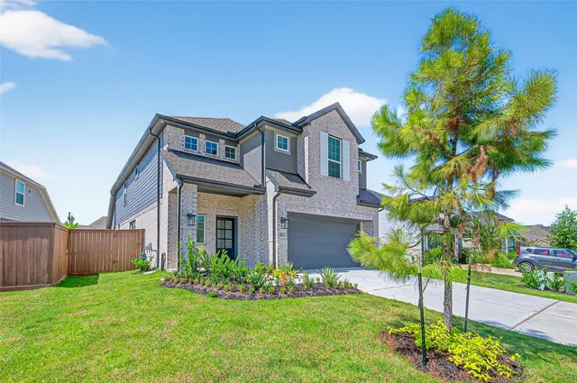 a front view of house with yard