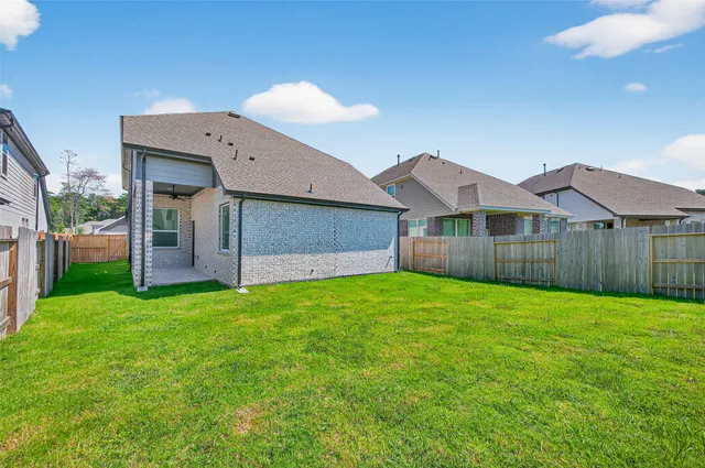 a house view with a garden space