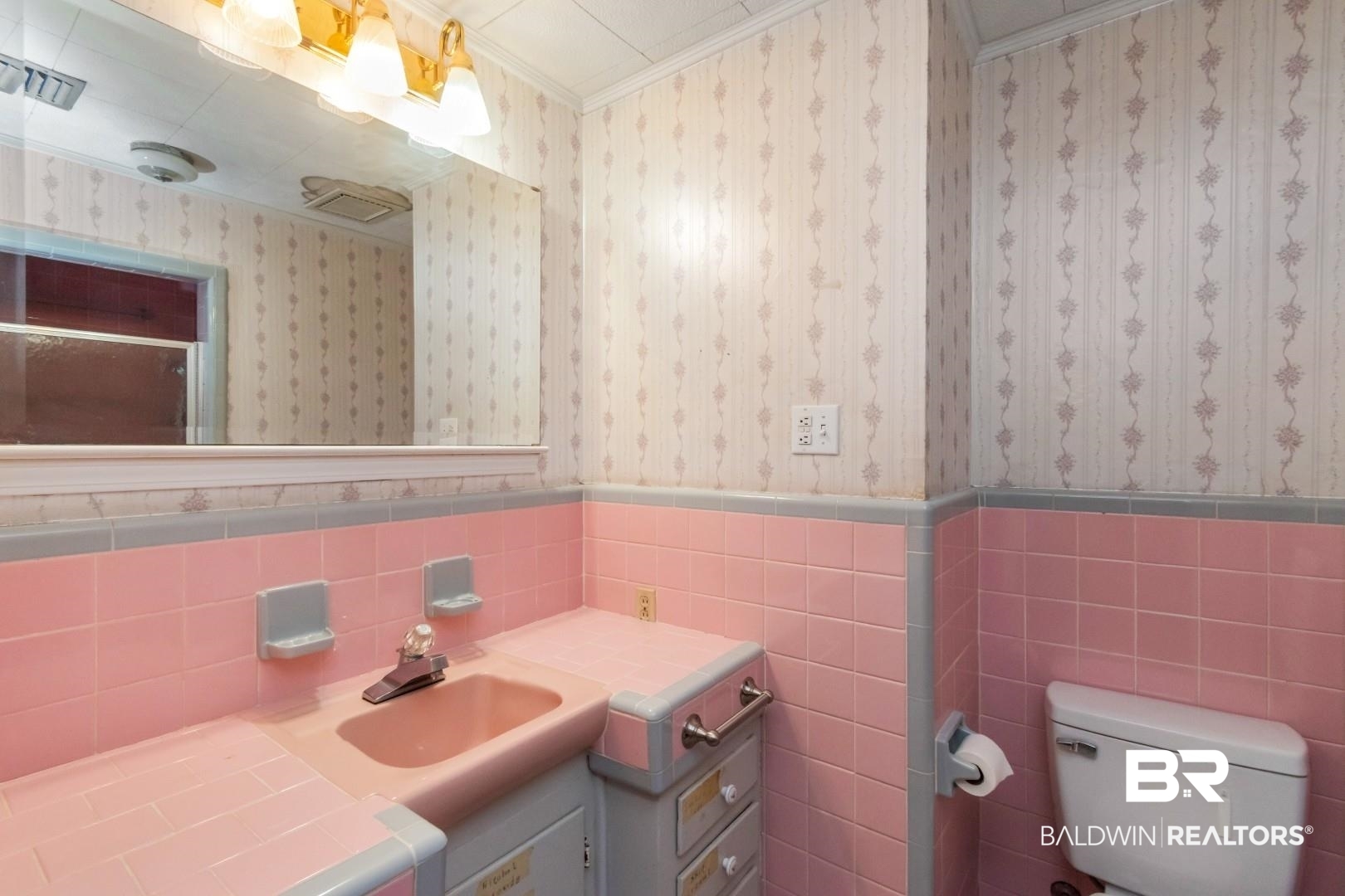 6300 Woodcrest Drive Mobile, AL 36608 - Photo 20 of 35 Bathroom with wainscoting, tile walls, crown molding, and toilet