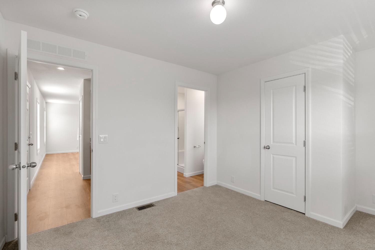 3707 Farmington Road, Unit 7 Stockton, CA 95215 - Photo 13 of 20 a view of a livingroom with a walk in closet and wooden floor