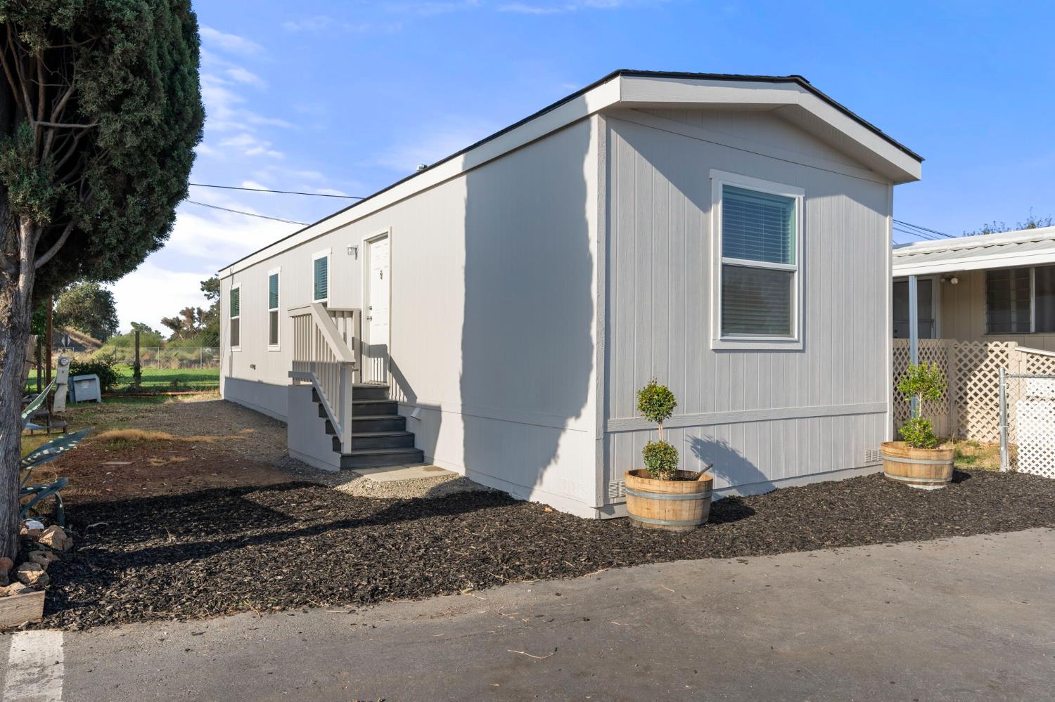 3707 Farmington Road, Unit 7 Stockton, CA 95215 - Photo 4 of 20 a view of a house with a outdoor space