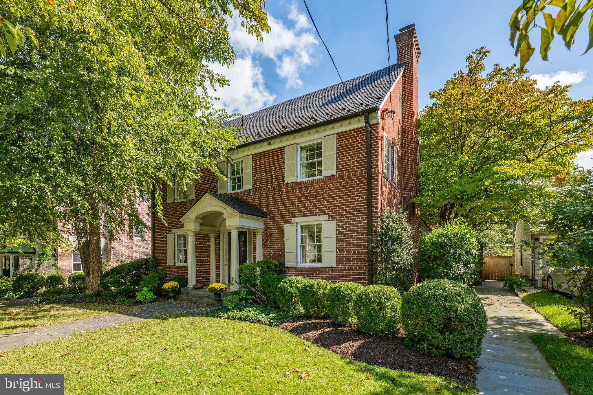 5511 Grove Street Chevy Chase, MD 20815 - Photo 2 of 33 a front view of a house with garden