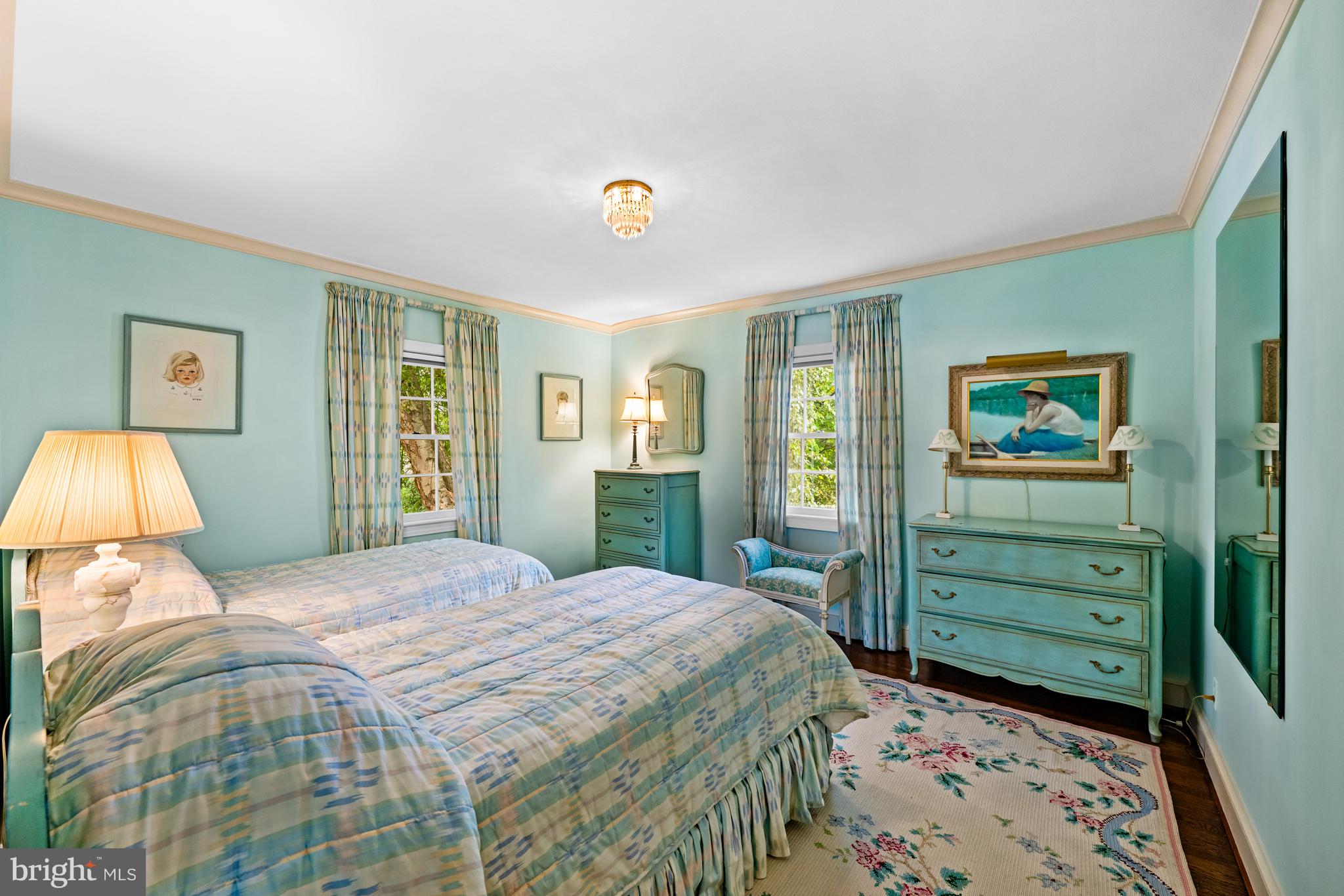 5511 Grove Street Chevy Chase, MD 20815 - Photo 21 of 33 a bedroom with a bed and a dresser in it