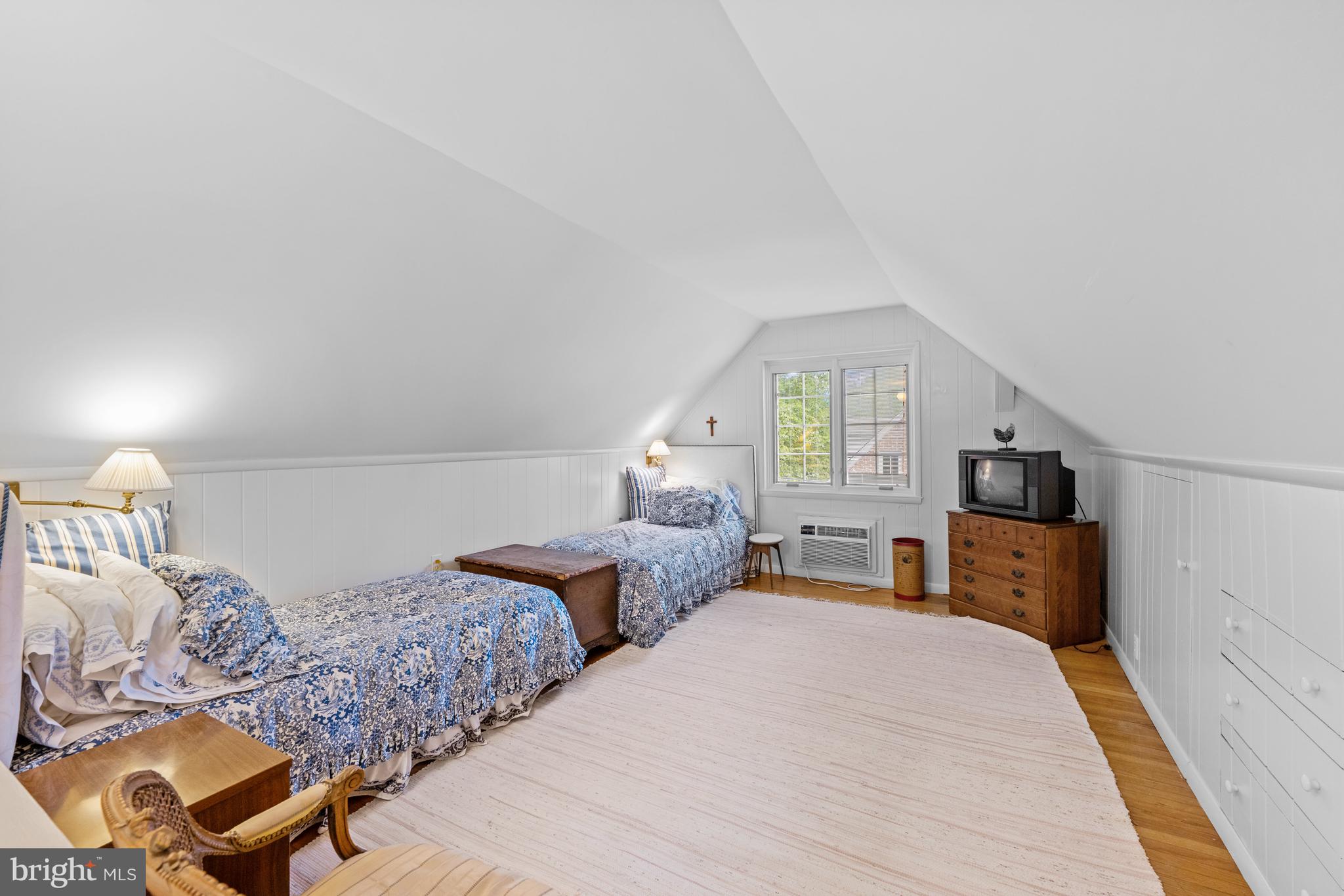 5511 Grove Street Chevy Chase, MD 20815 - Photo 24 of 33 a bedroom with two beds and a couch