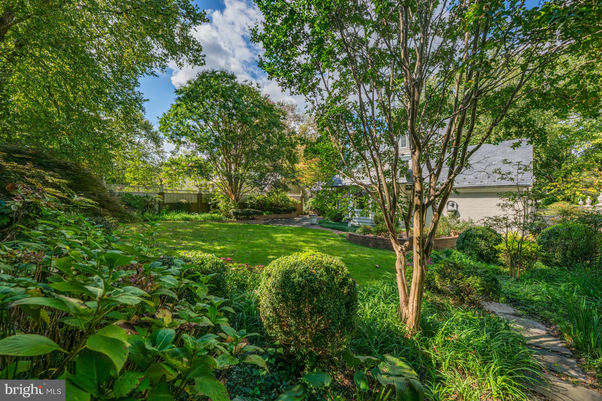 5511 Grove Street Chevy Chase, MD 20815 - Photo 30 of 33 a backyard of a house with lots of green space