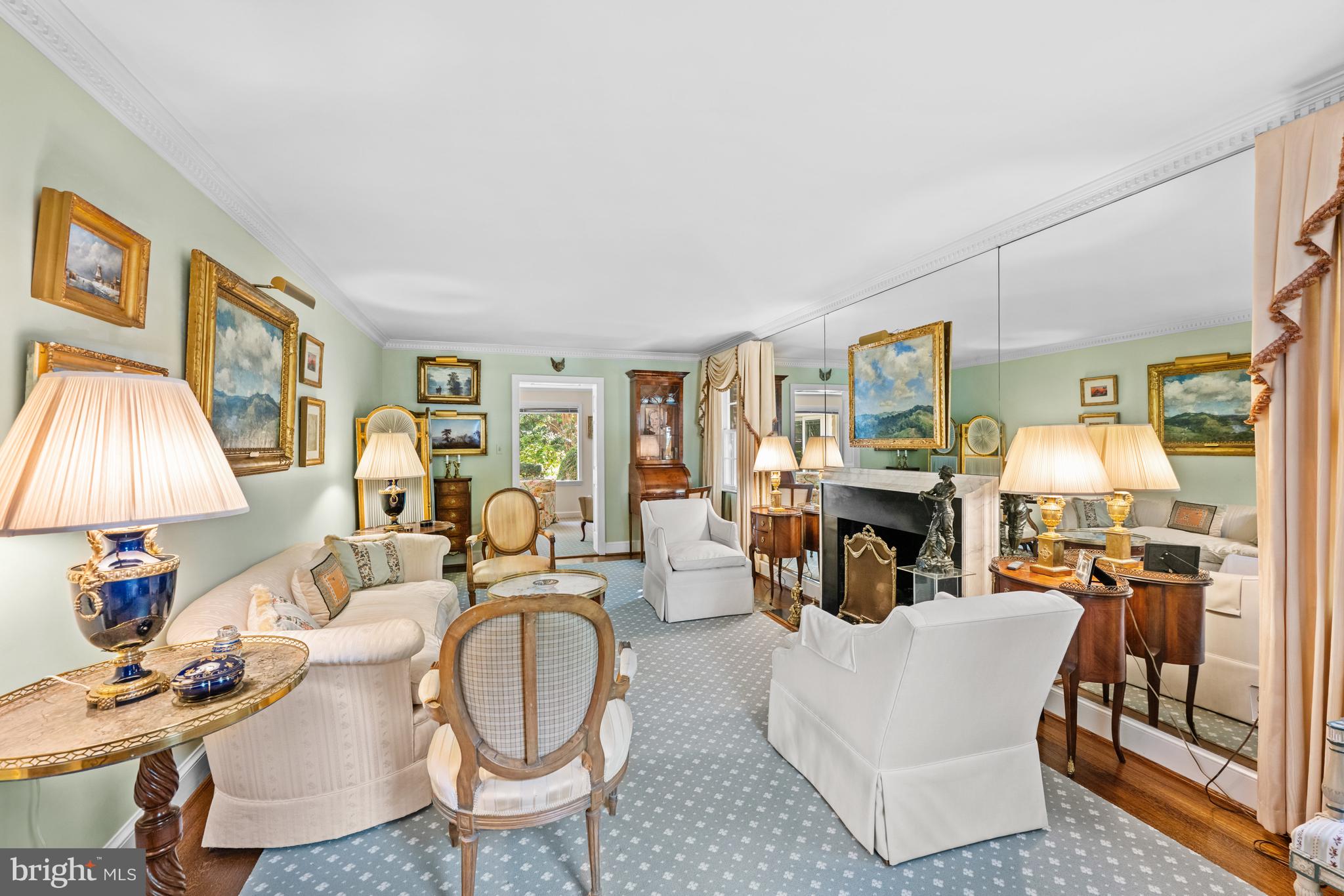 5511 Grove Street Chevy Chase, MD 20815 - Photo 5 of 33 a living room with fireplace furniture and a flat screen tv