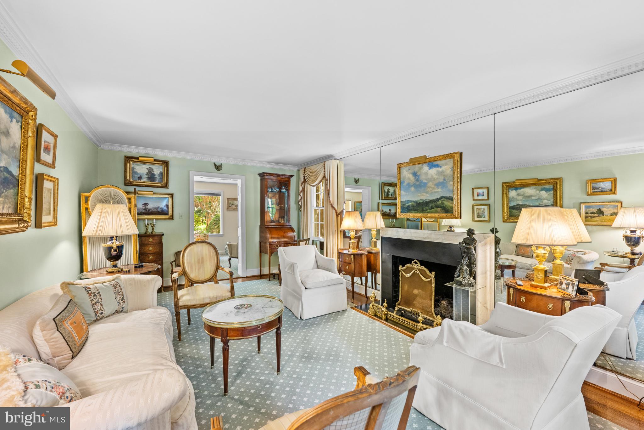 5511 Grove Street Chevy Chase, MD 20815 - Photo 6 of 33 a living room with fireplace furniture and a table