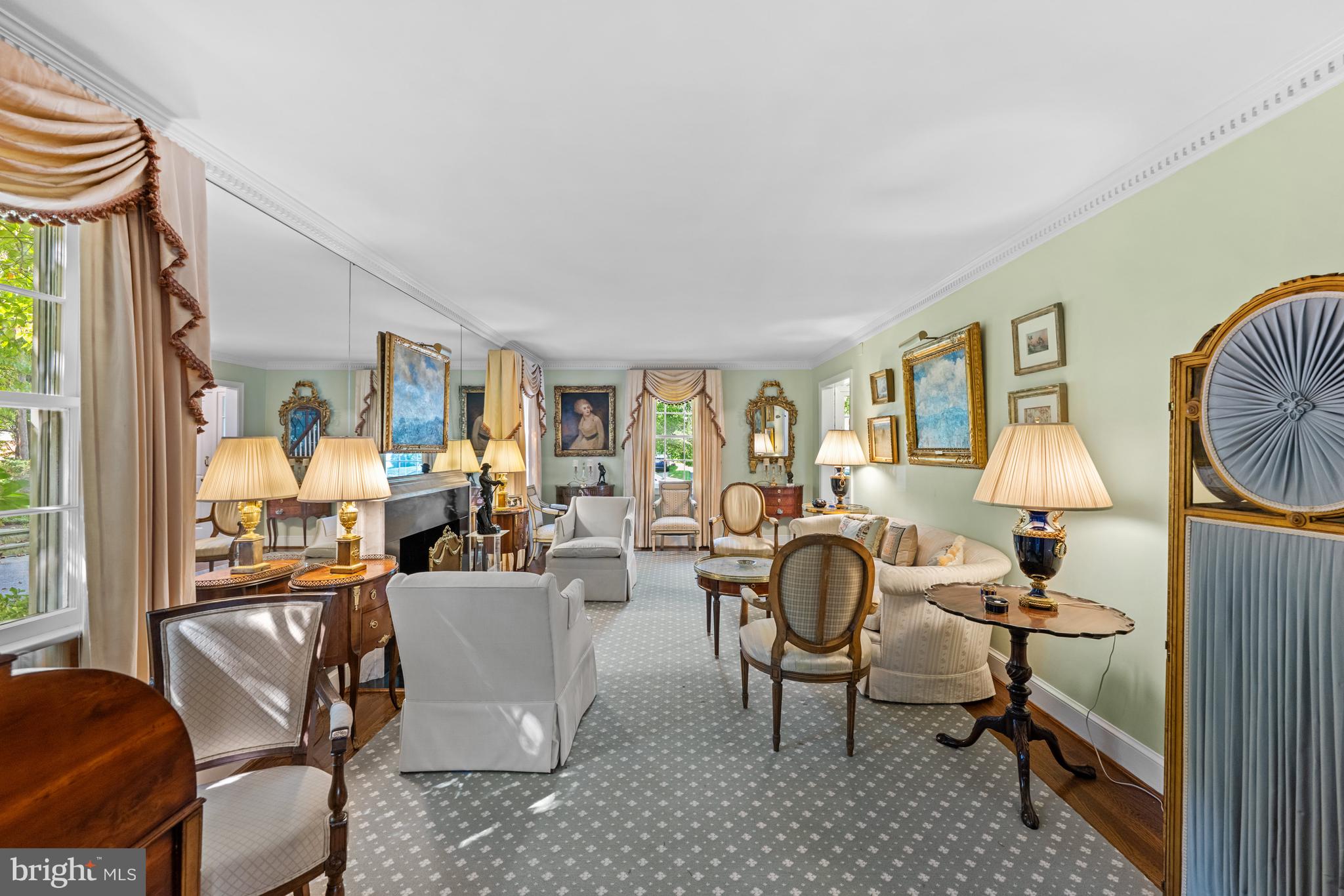5511 Grove Street Chevy Chase, MD 20815 - Photo 7 of 33 a living room with furniture a window and a lamp