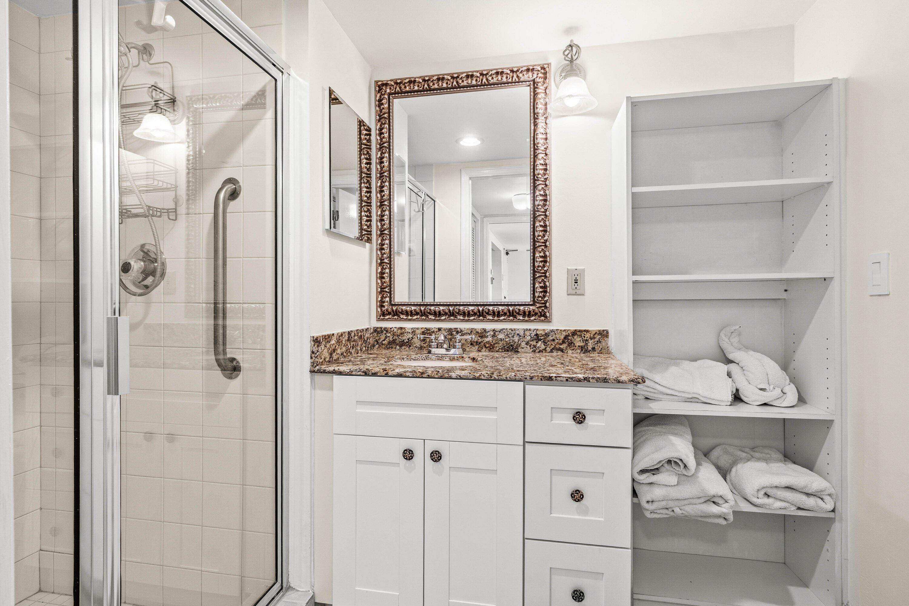 100 Southeast 5th Avenue, Unit 311 Boca Raton, FL 33432 - Photo 21 of 57 a bathroom with a granite countertop sink and a mirror