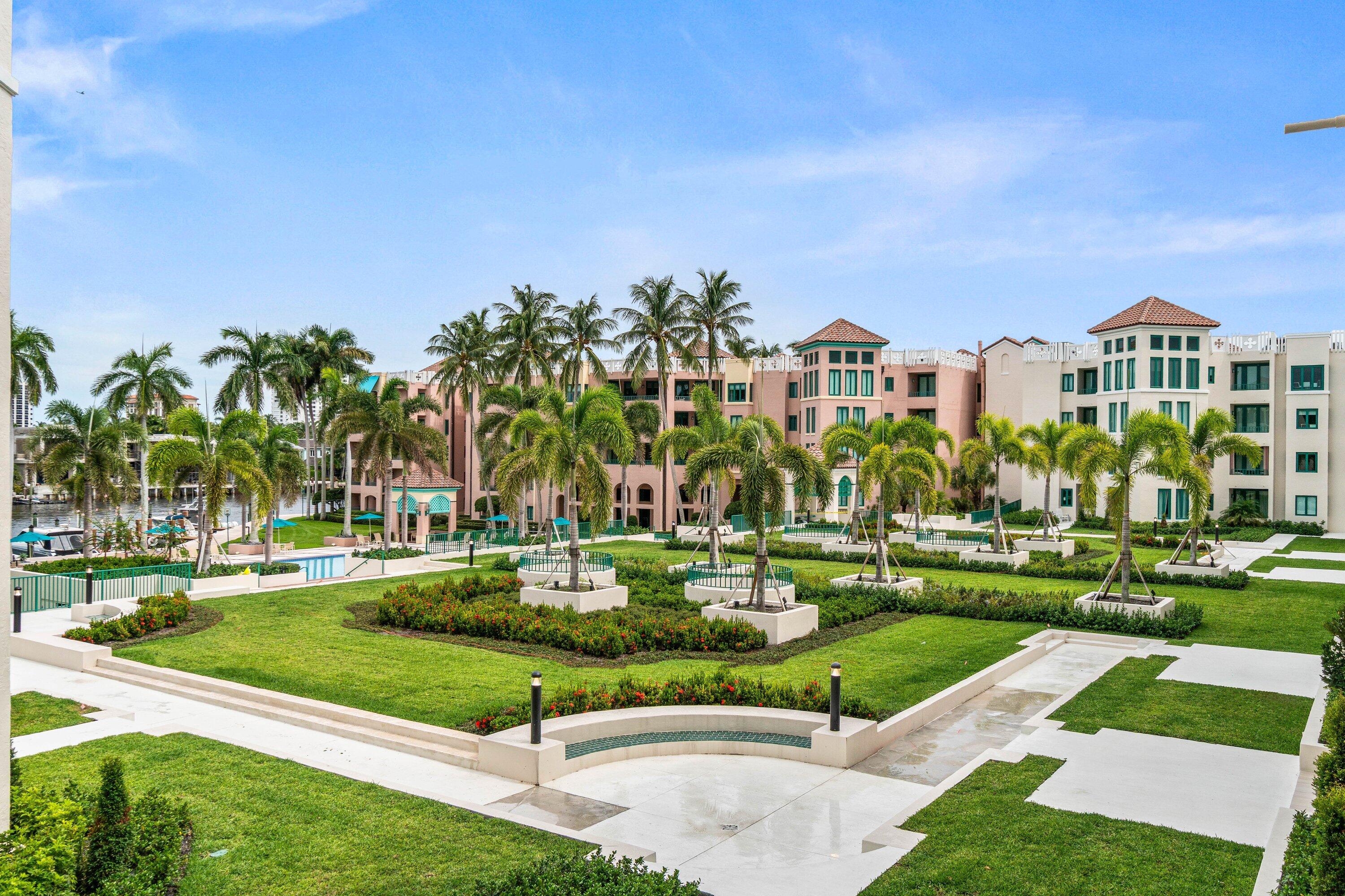 100 Southeast 5th Avenue, Unit 311 Boca Raton, FL 33432 - Photo 23 of 57 a view of a big building with a big yard and plants