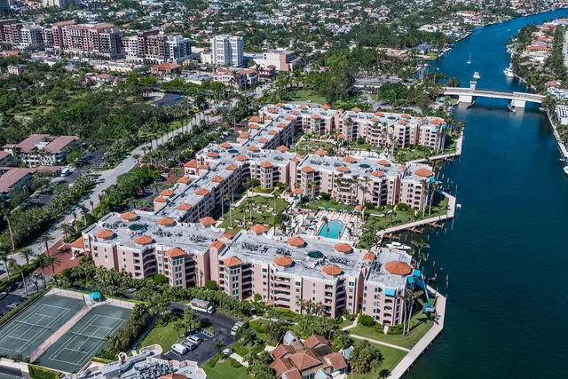a view of lobby with a rug and a book shelf