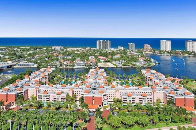 a living room with fireplace furniture and decor