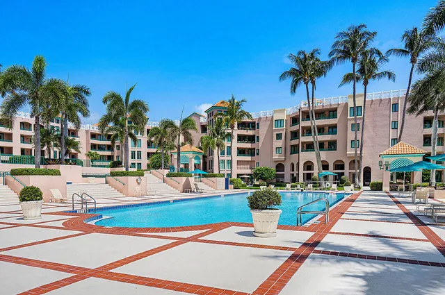 a view of outdoor space with swimming pool and lounge chair