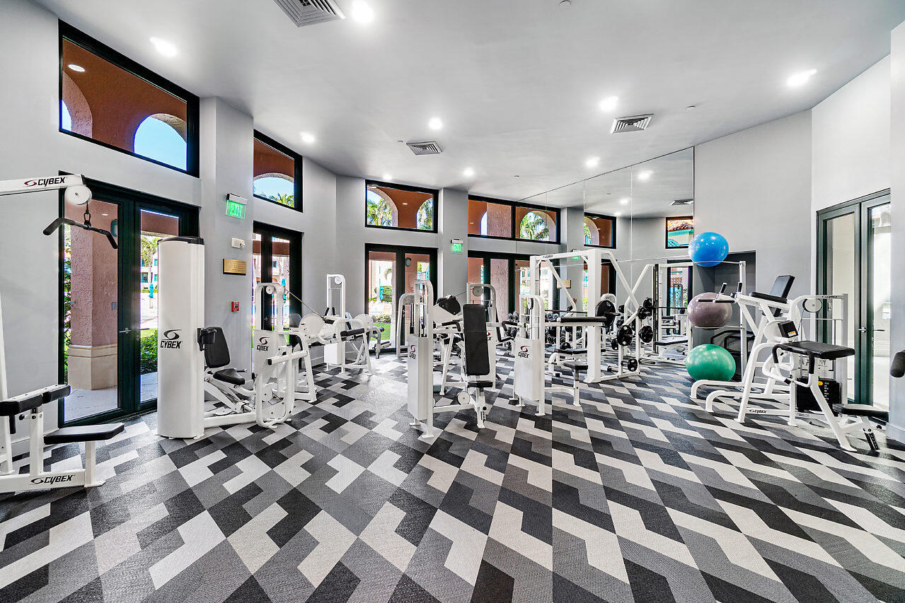 100 Southeast 5th Avenue, Unit 311 Boca Raton, FL 33432 - Photo 45 of 57 a very nice looking room with lots of gym equipment