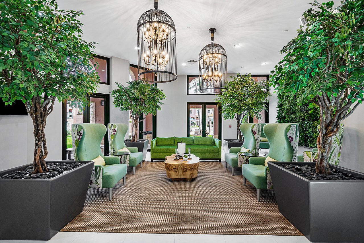 100 Southeast 5th Avenue, Unit 311 Boca Raton, FL 33432 - Photo 48 of 57 a living room filled with furniture