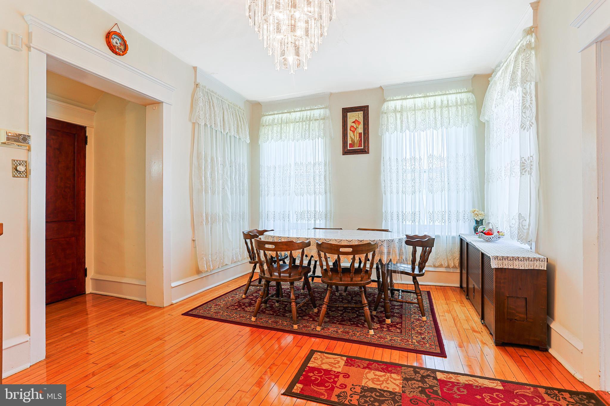 5236 Ridge Avenue Philadelphia, PA 19128 - Photo 13 of 45 a dining room with a table and chairs