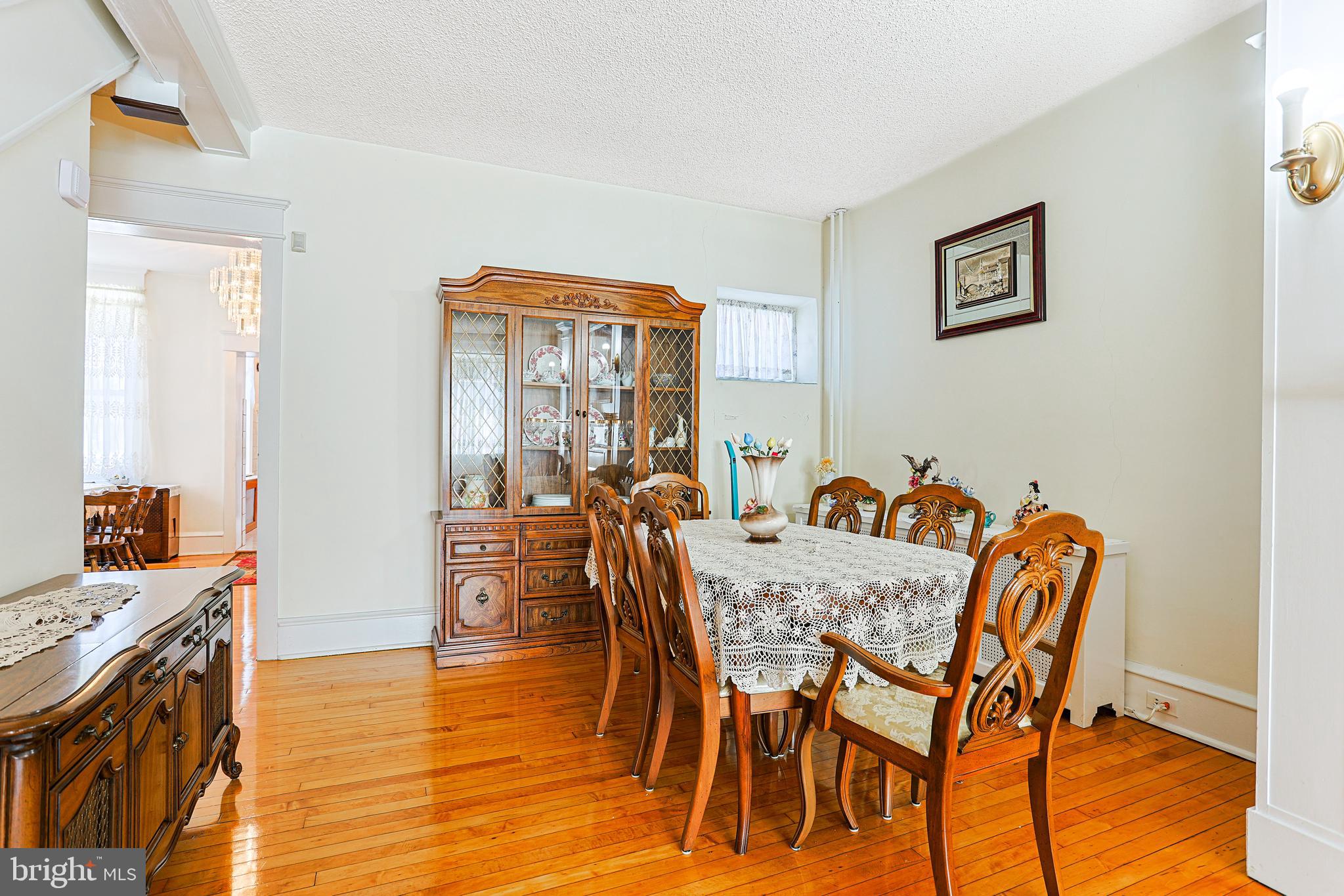 5236 Ridge Avenue Philadelphia, PA 19128 - Photo 15 of 45 a view of a dining room with furniture and wooden floor